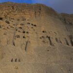 Ancient kingdom discovered in Nepal where thousands of caves are carved 155ft off the ground